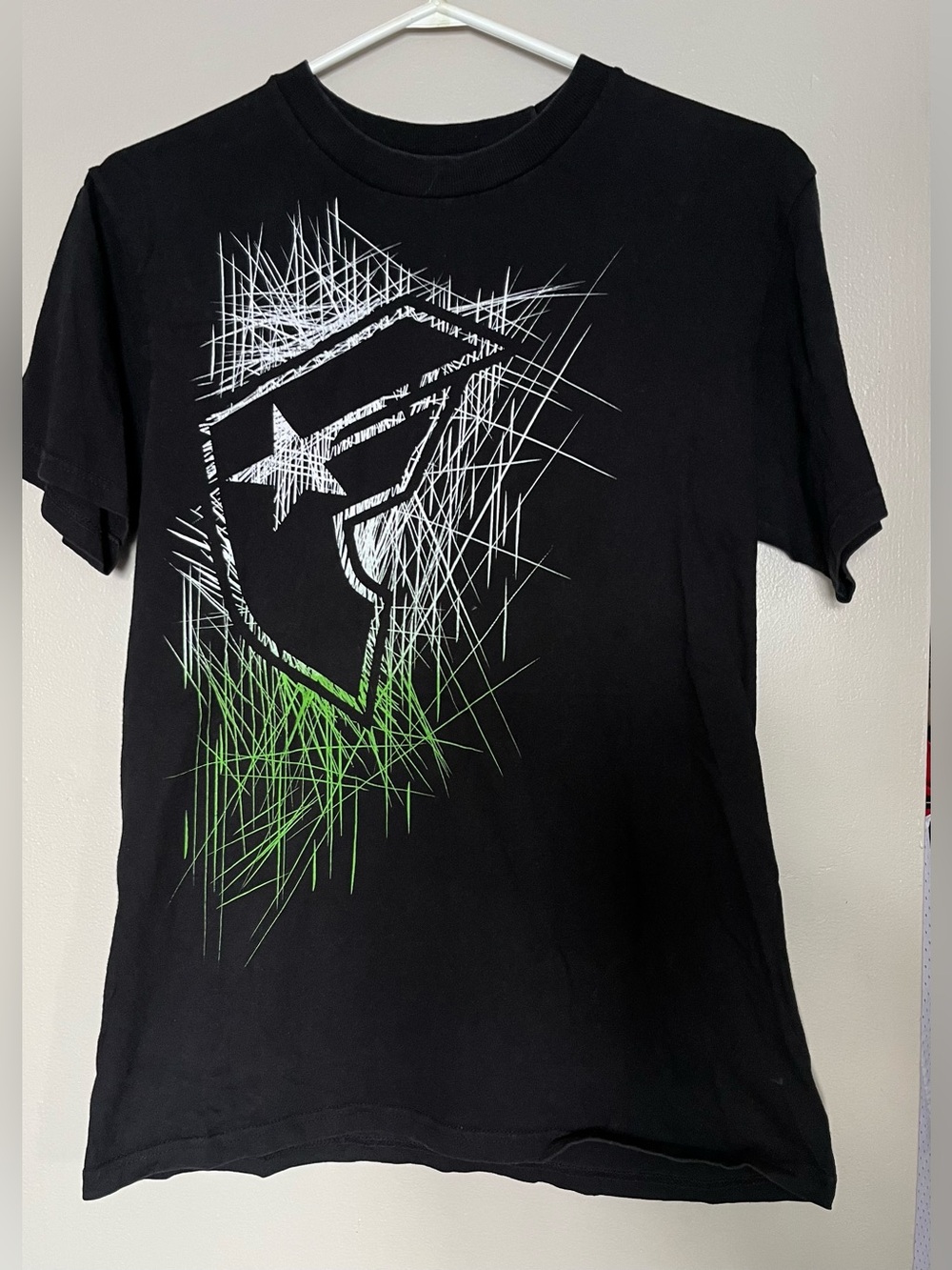 Y2K famous star and straps graphic shirt
